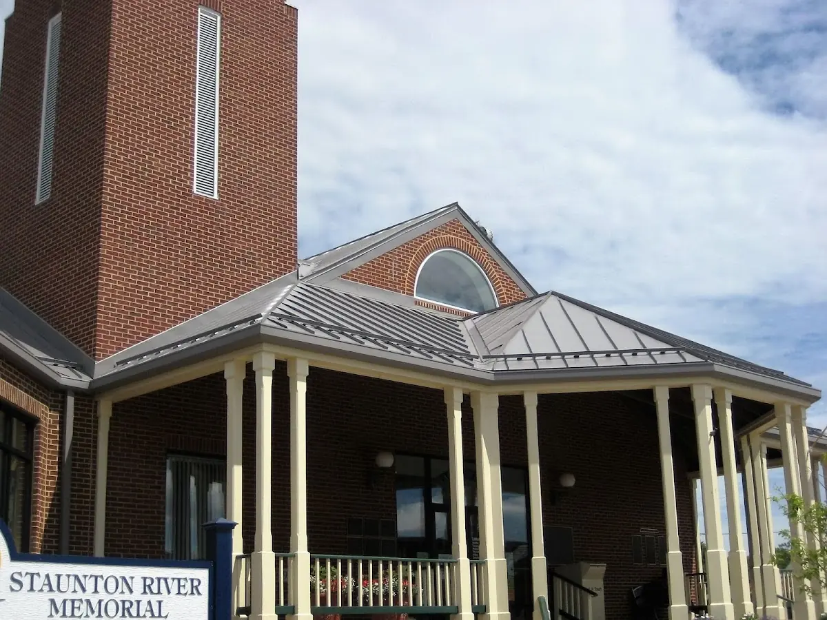 Skilled roofing craftsmen working on a residential roof in Moyle Heights